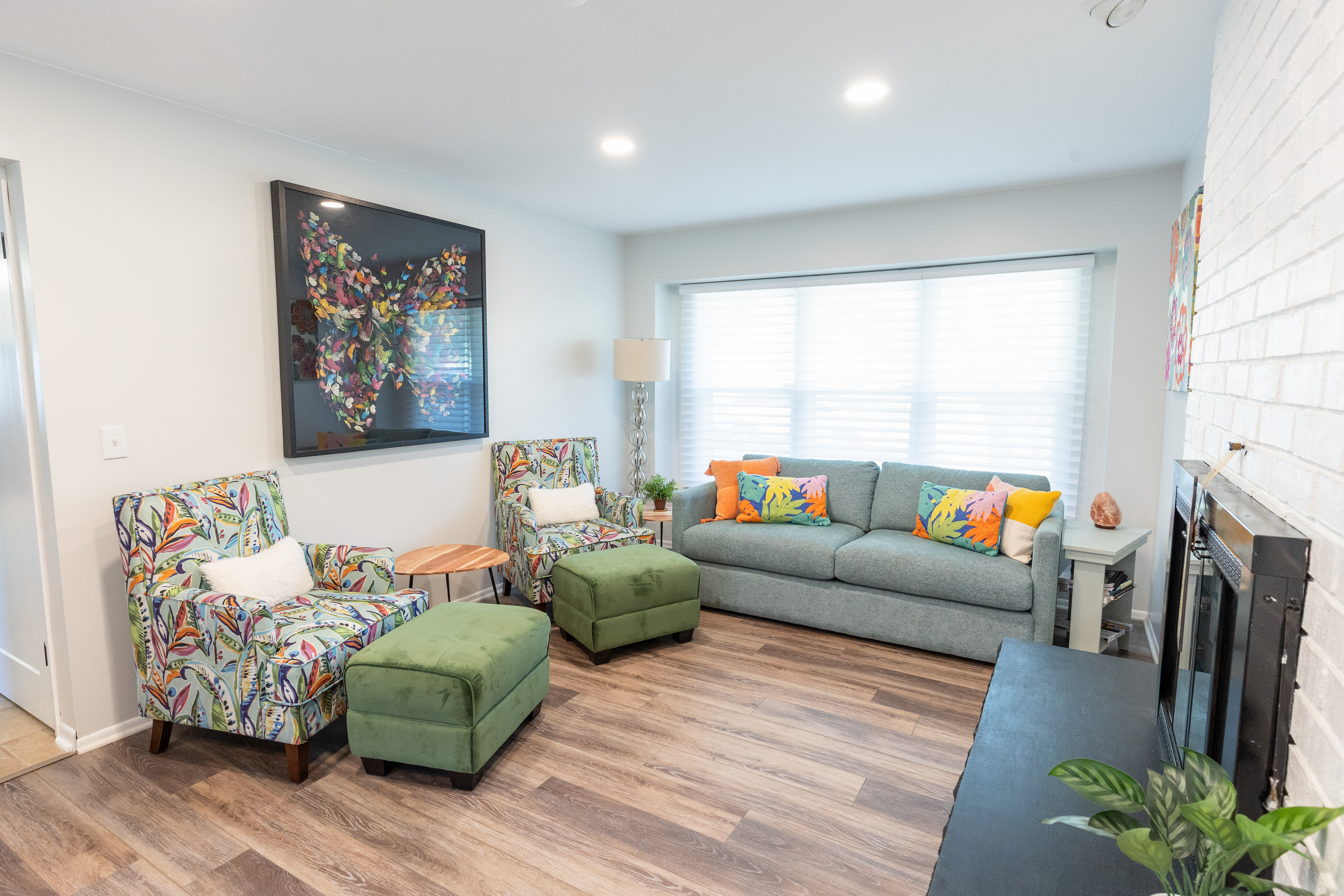 Florida Chairs and Teal Sofa Den